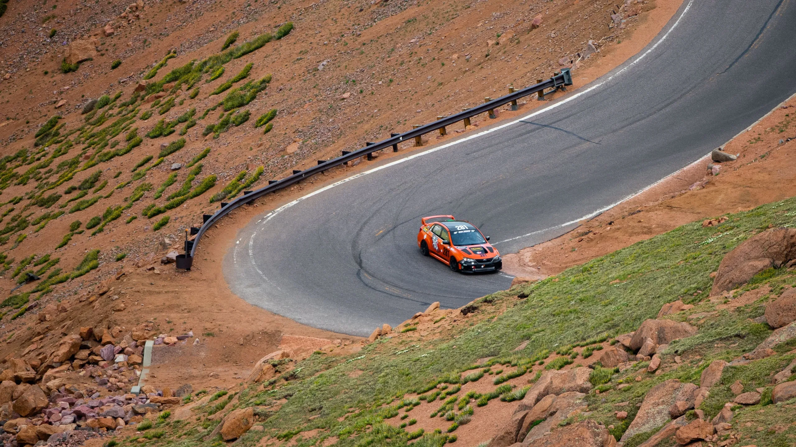 The #281 attacking a red-rock corner high on the mountain